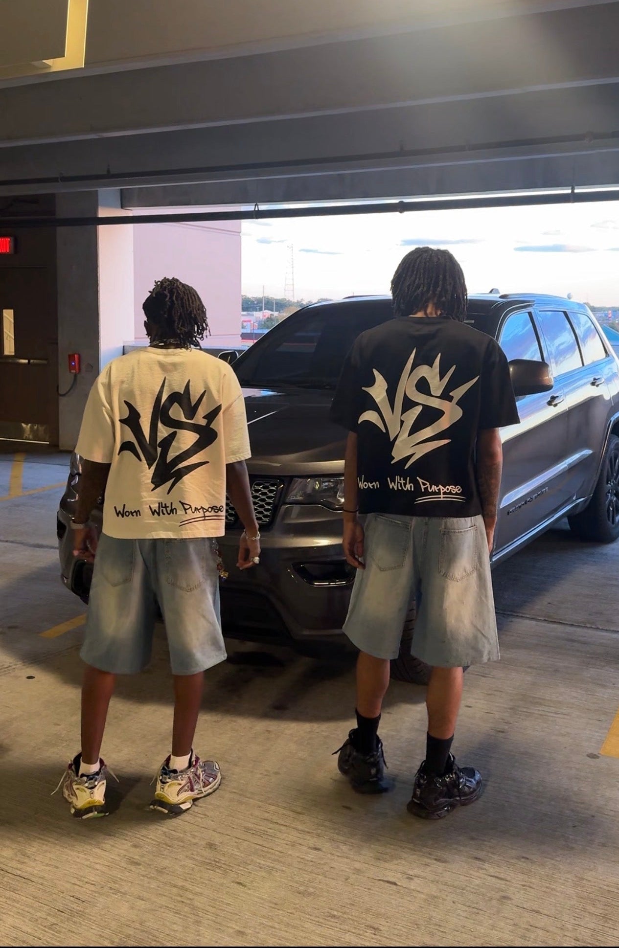 Black multi logo oversized tee