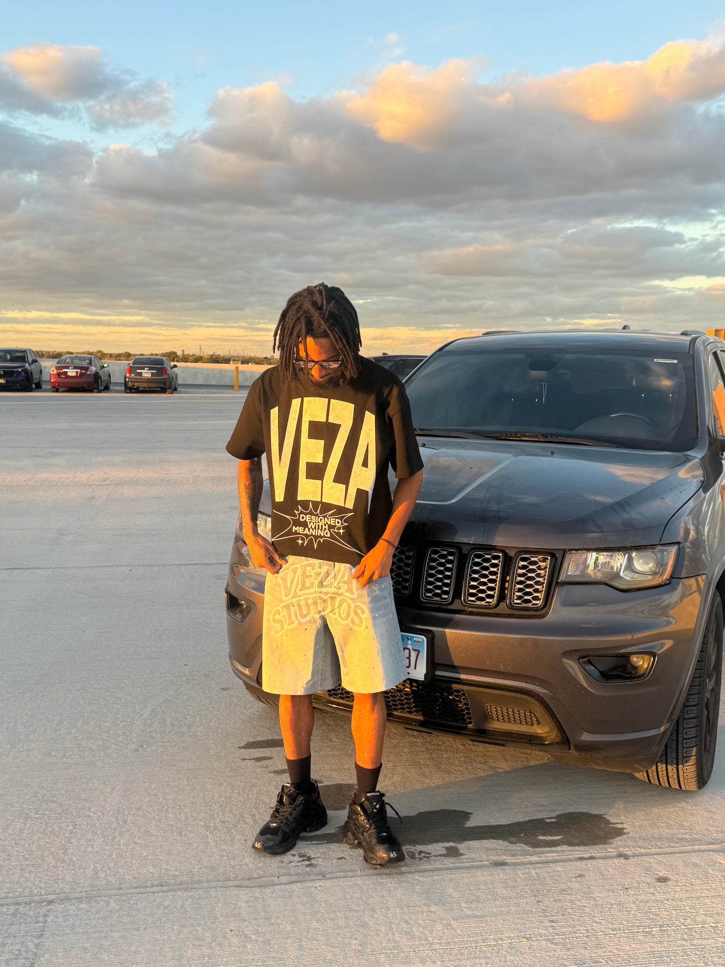 Black multi logo oversized tee