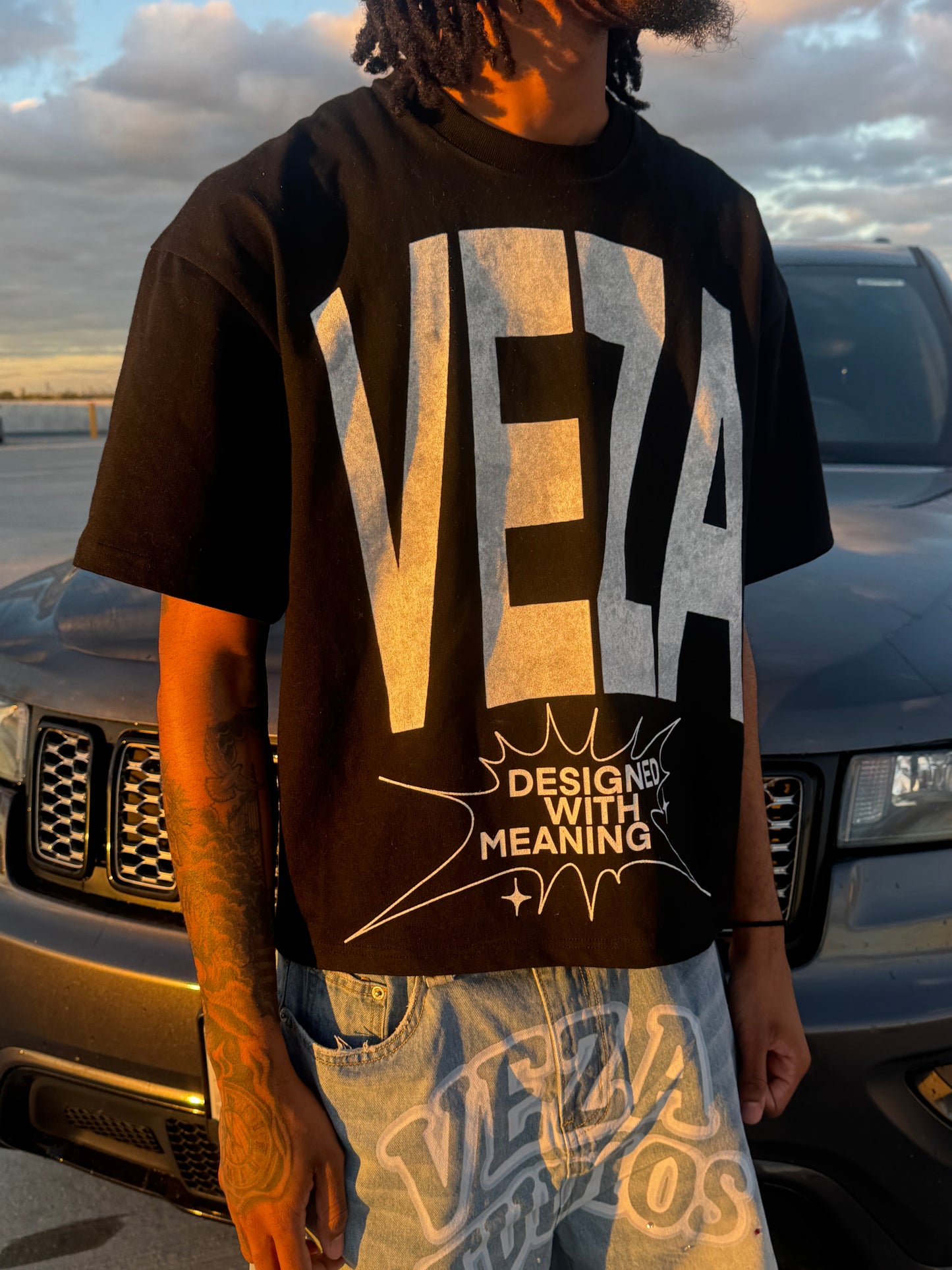 Black multi logo oversized tee